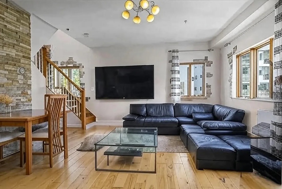 This bright and spacious 2-bedroom, 1.5-bath duplex